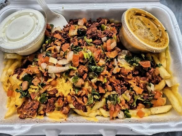 Carne Asada Fries Sin Queso Sauce.